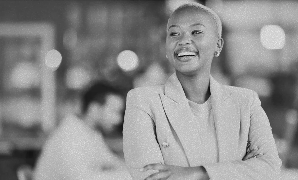 woman in blazer smiling